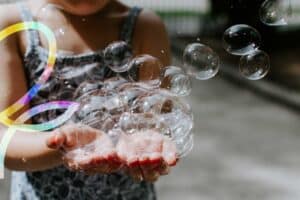 Bubbles leaving hand