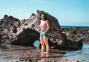 Young female smiling on beach