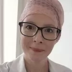 Woman looking at camera smiling