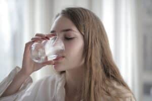 Woman drinking glass of water